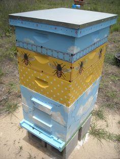 The hive with the instrumented base under it, out in the yard.