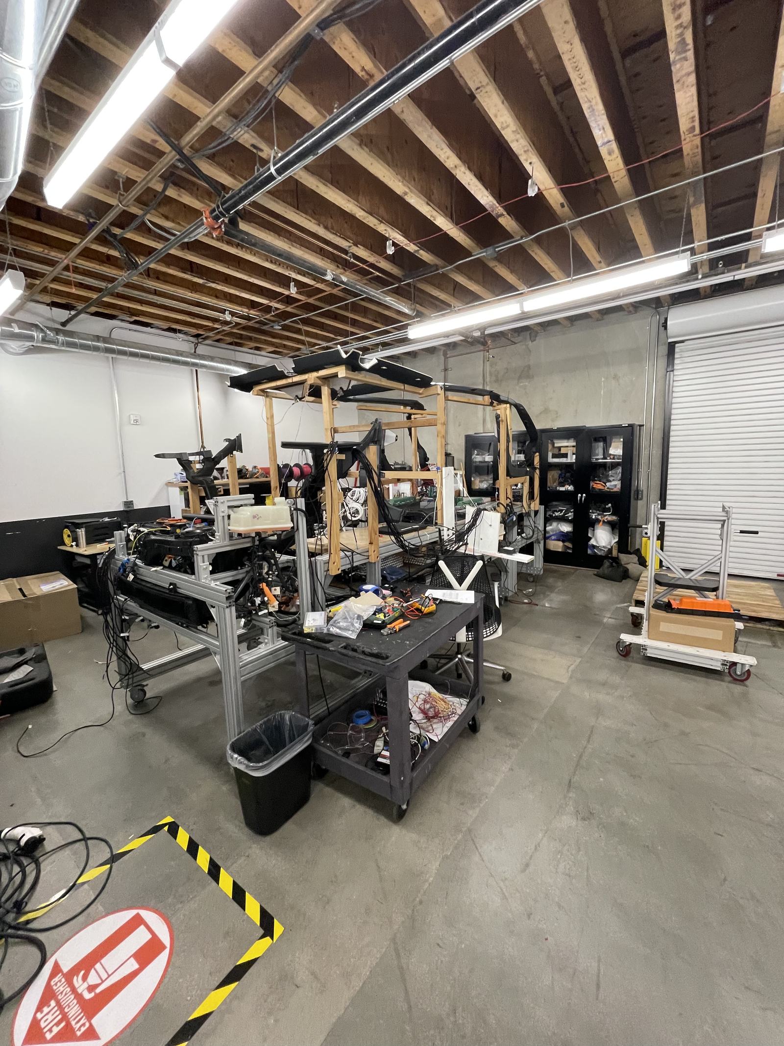 The test lab, with the benches and vehicle frames they were built around.
