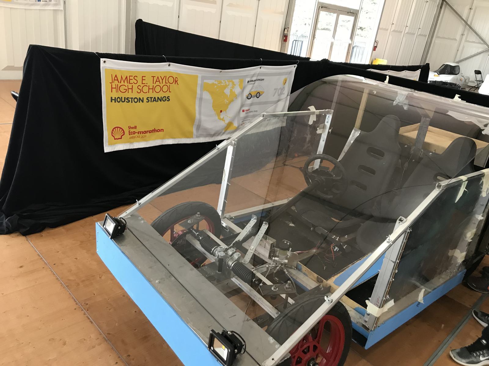 The car in the shop, body off, before the competition.